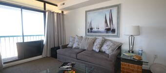 Enjoy Sunrise and dolphin's swimming every morning from your personal balcony!