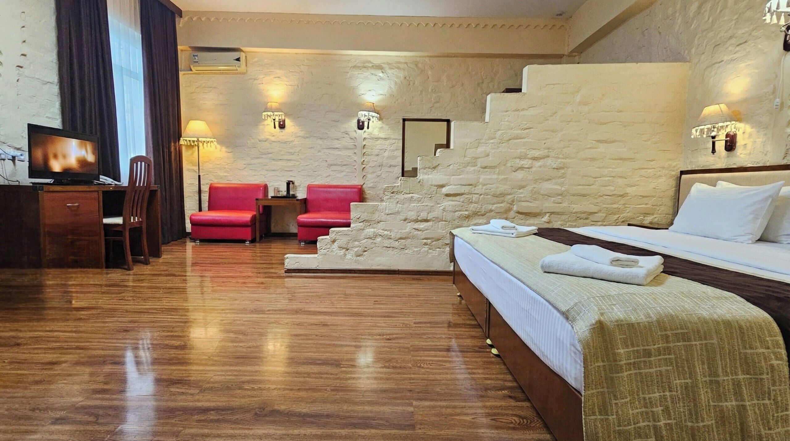 Premium bedding, down duvets, desk, laptop workspace