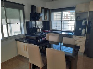 Private kitchen - Apartment in private house 900m from the beach (Soliman)