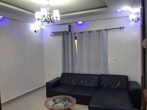Deluxe Apartment | Living area | Printers - RÉSIDENCE ZEINA (Dakar)
