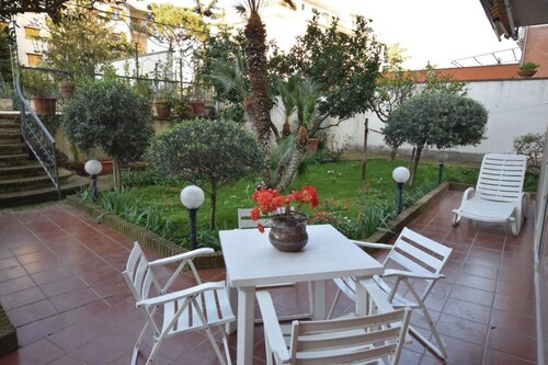 Apartment with Garden and Terraces