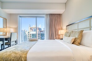 1 chambre, coffres-forts dans les chambres, fer et planche à repasser