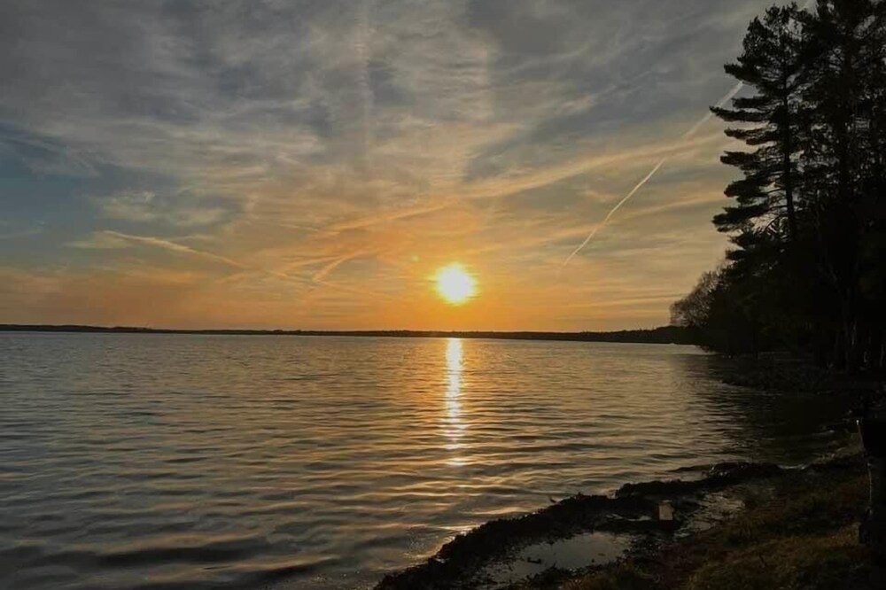Perfect location on East Twin Lake, walking distance to town! Unit #2