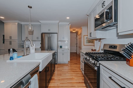 Fridge, microwave, oven, stovetop. Artopia Retreat House