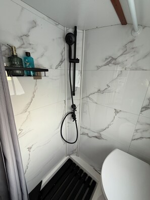 Shower, towels, soap, shampoo