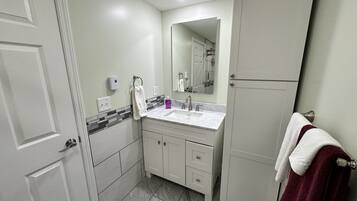 Shower, towels, soap, shampoo