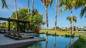 Outdoor pool, a heated pool, pool loungers
