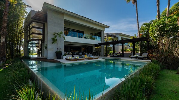 Outdoor pool, a heated pool, pool loungers