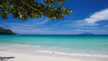 On the beach, white sand