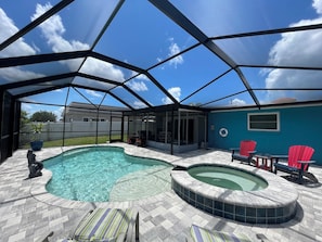 Outdoor pool, a heated pool - Sunset Serenity Retreat: Coastal Elegance with Poolside Bliss (New Port Richey)