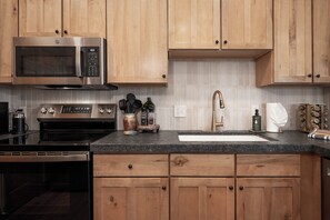 Fridge, microwave, oven, stovetop - Remodeled Granby Ranch Condo - King Bed, Firepit, Walk to Lifts (Granby)