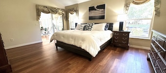 Great location..Climate-controlled lanai & NEW 2024 4-SEATER GOLF CART INCLUDED!
