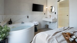 Deluxe Double Room, Jetted Tub, City View | Living area | 43-inch Smart TV with satellite channels, TV - Amphitrite hotel (Chania)
