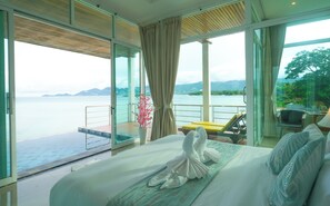 Beachfront Pool Suit | Minibar, in-room safe, desk, blackout drapes