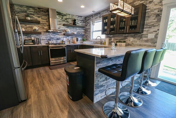 Fridge, microwave, oven, stovetop - Lavish Spacious Home Near Town • Game Room • 4BR (Princeton)