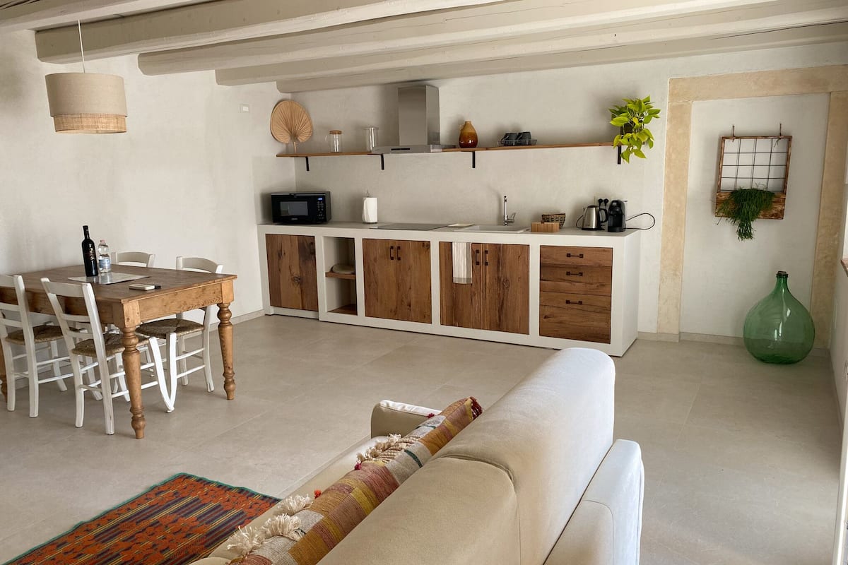Comfort apartman | Nappalirész | Okostévé, kandalló és padlófűtés