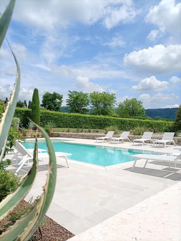 Seasonal outdoor pool, pool umbrellas, sun loungers