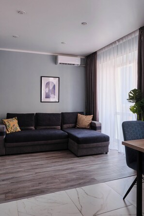 Superior Studio Suite | Premium bedding, blackout drapes, iron/ironing board, free WiFi - Seven City Apartments (Semipalatinsk)