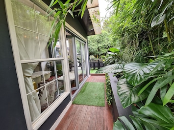 Backyard entrance and outdoor setting, Bamboo House