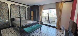 Quarto premium | Frigobar, escrivaninha, quartos à prova de som, Wi-Fi de cortesia