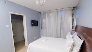 Standard Room | Blackout drapes, iron/ironing board, WiFi (free), bed sheets - Orangestar Lodge  (Harare)