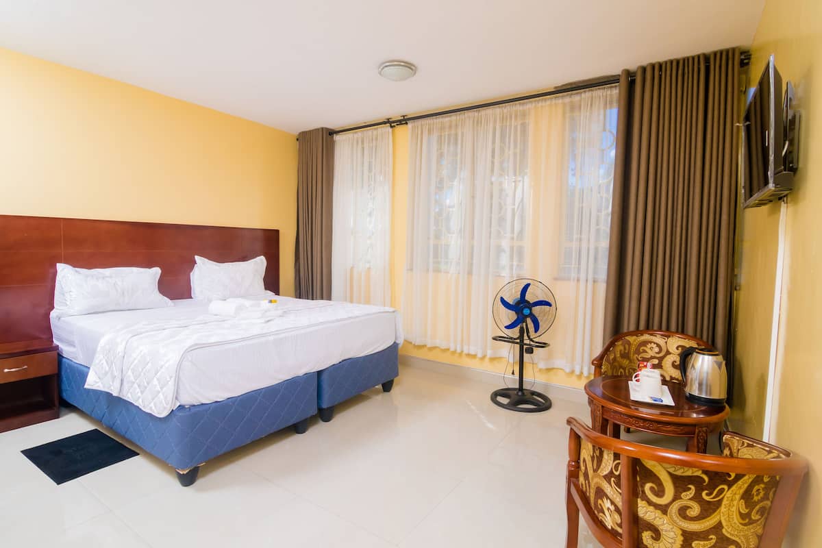 Blackout curtains, iron/ironing board, free WiFi, bed sheets