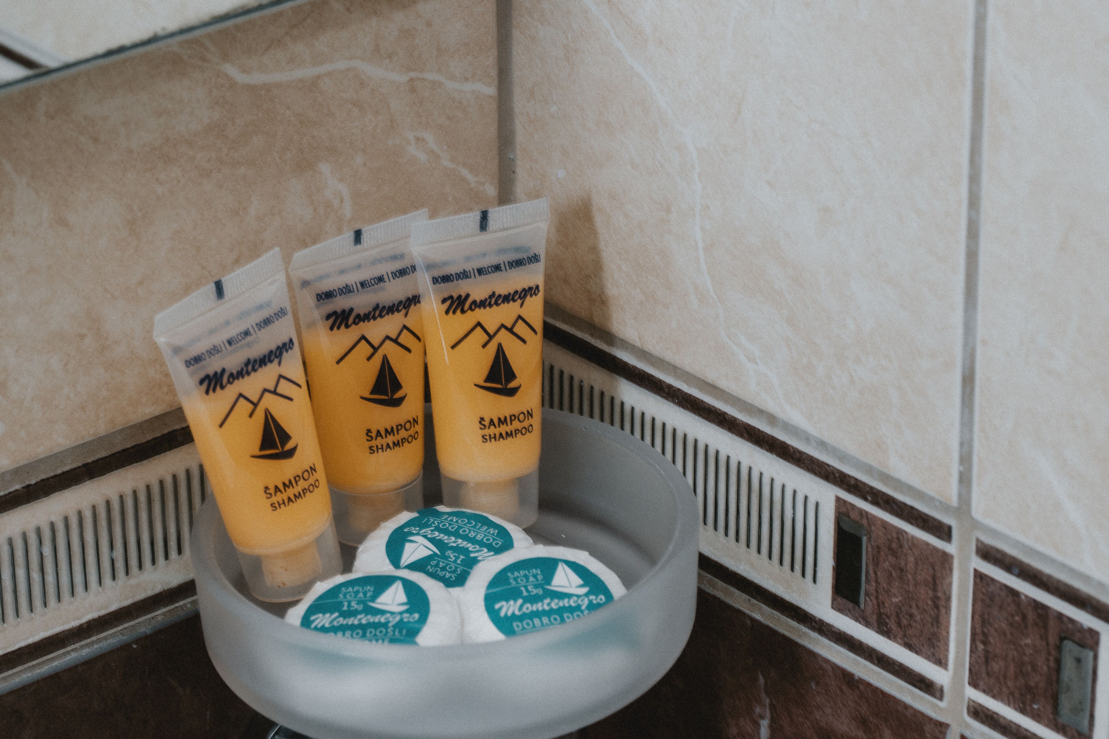 Shower, designer toiletries, hair dryer, towels