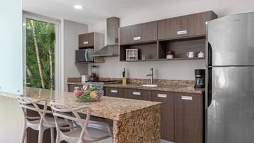 Fridge, microwave, stovetop, cookware/dishes/utensils