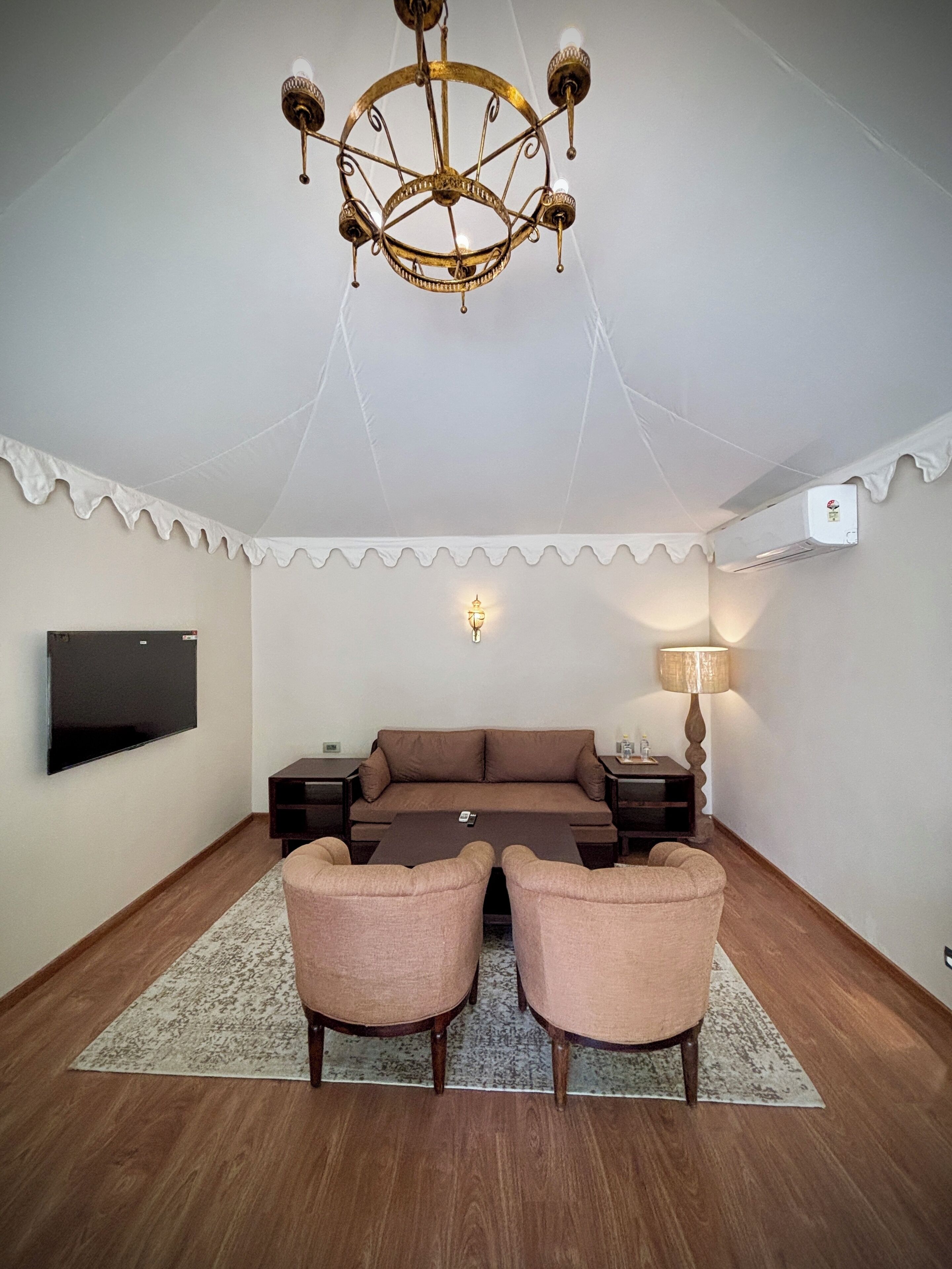 Executive Room, 1 King Bed | Living area | 65-inch LED TV with cable channels