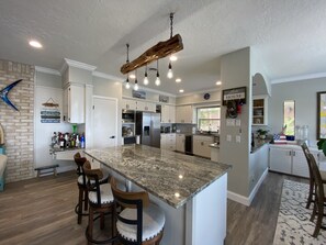 Fridge, microwave, oven, stovetop - Hidden Gem Waterfront home in gated Country Club community on Lake Conroe.   (Montgomery)