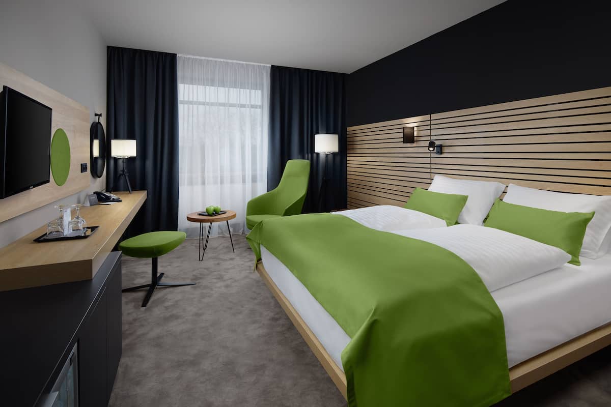 Premium Double Room, 1 King Bed, Pool Access, Park View | Minibar, in-room safe, desk, laptop workspace