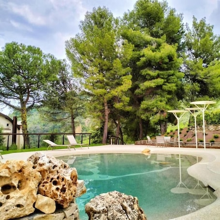 Seasonal outdoor pool, pool umbrellas, sun loungers
