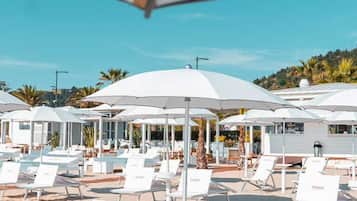 Private beach nearby, white sand, sun loungers, beach umbrellas