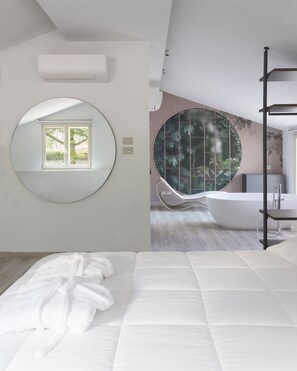 Luxe studio suite | Een minibar, een bureau, een laptopwerkplek, gratis wifi