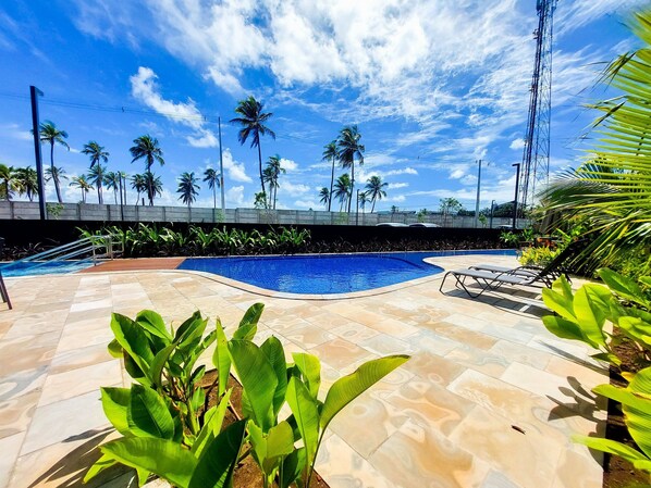 3 outdoor pools, pool umbrellas, pool loungers