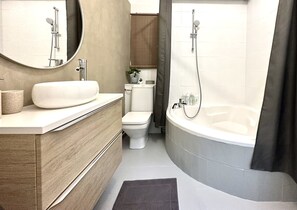 Hair dryer, towels, soap, shampoo
