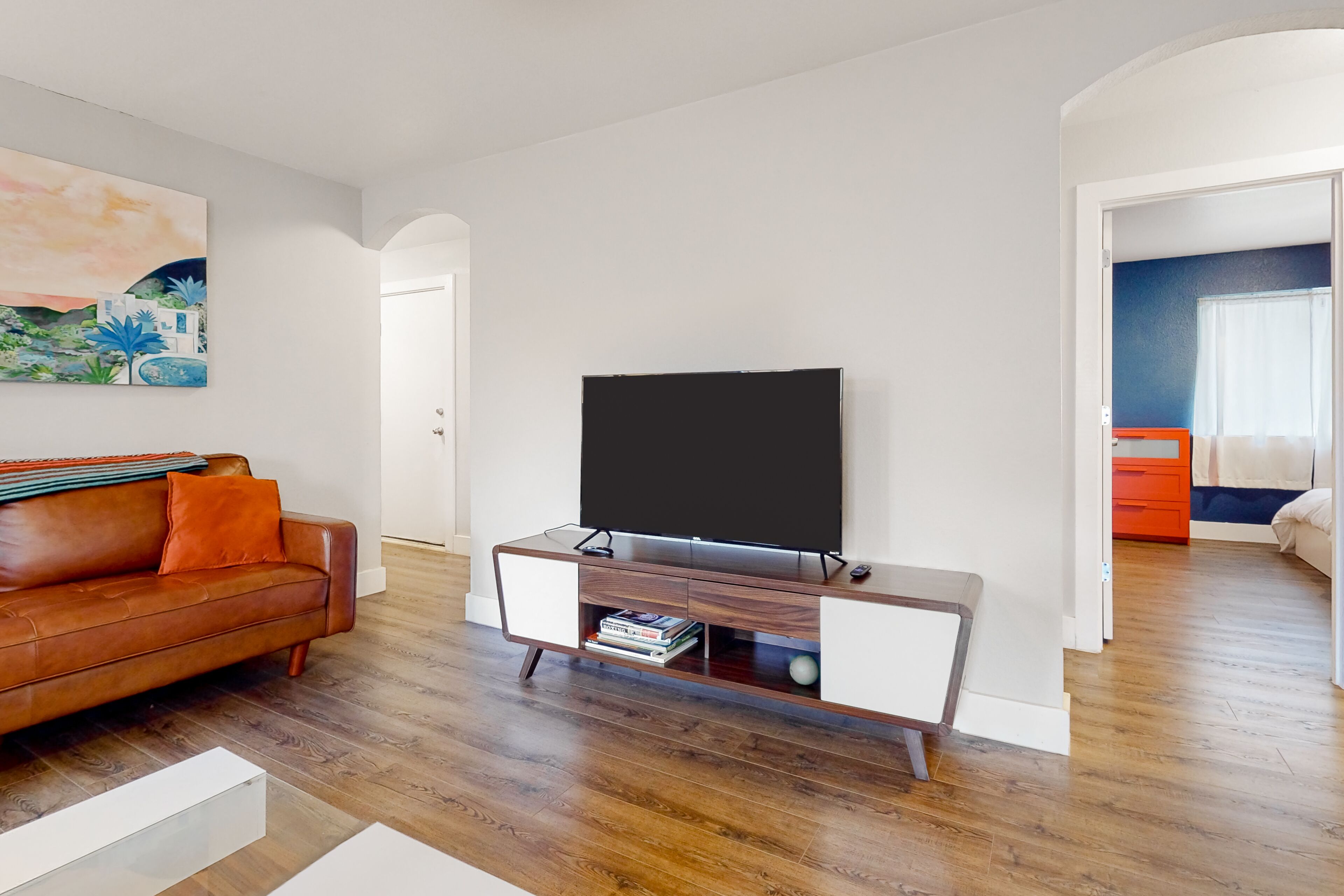 Conveniently located home with enclosed yard, covered patio, AC, & W/D