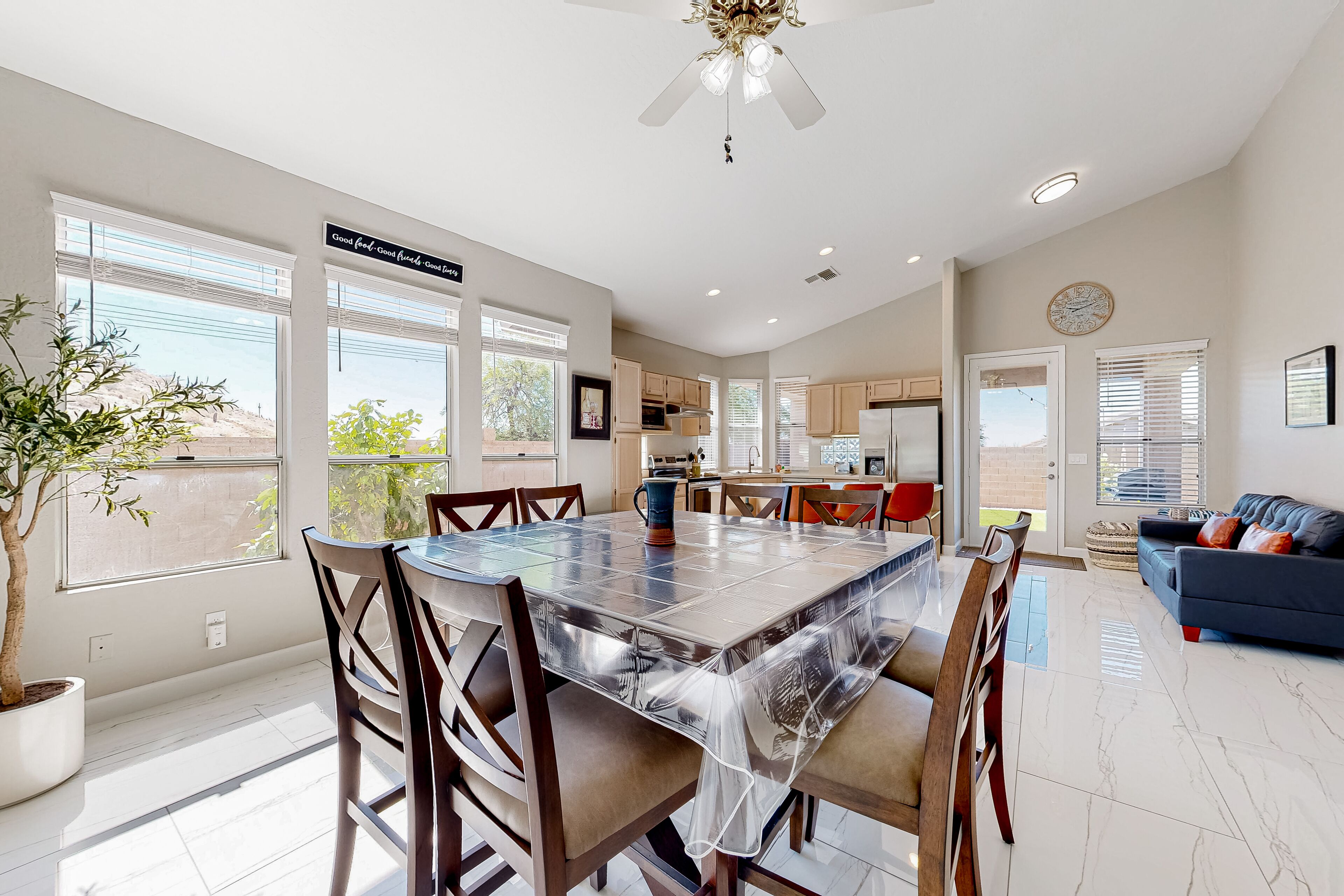 Charming home with enclosed yard, putting green, firepit, & mountain views