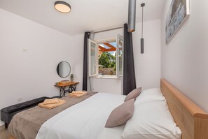 2 bedrooms, in-room safe, iron/ironing board, travel cot