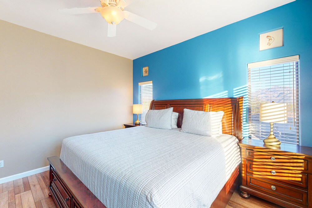 Sunny, dogfriendly condo with a heated pool, gym, grilling area