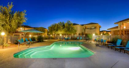 Sunny, dog-friendly condo with a heated pool, gym, grilling area, & golf nearby