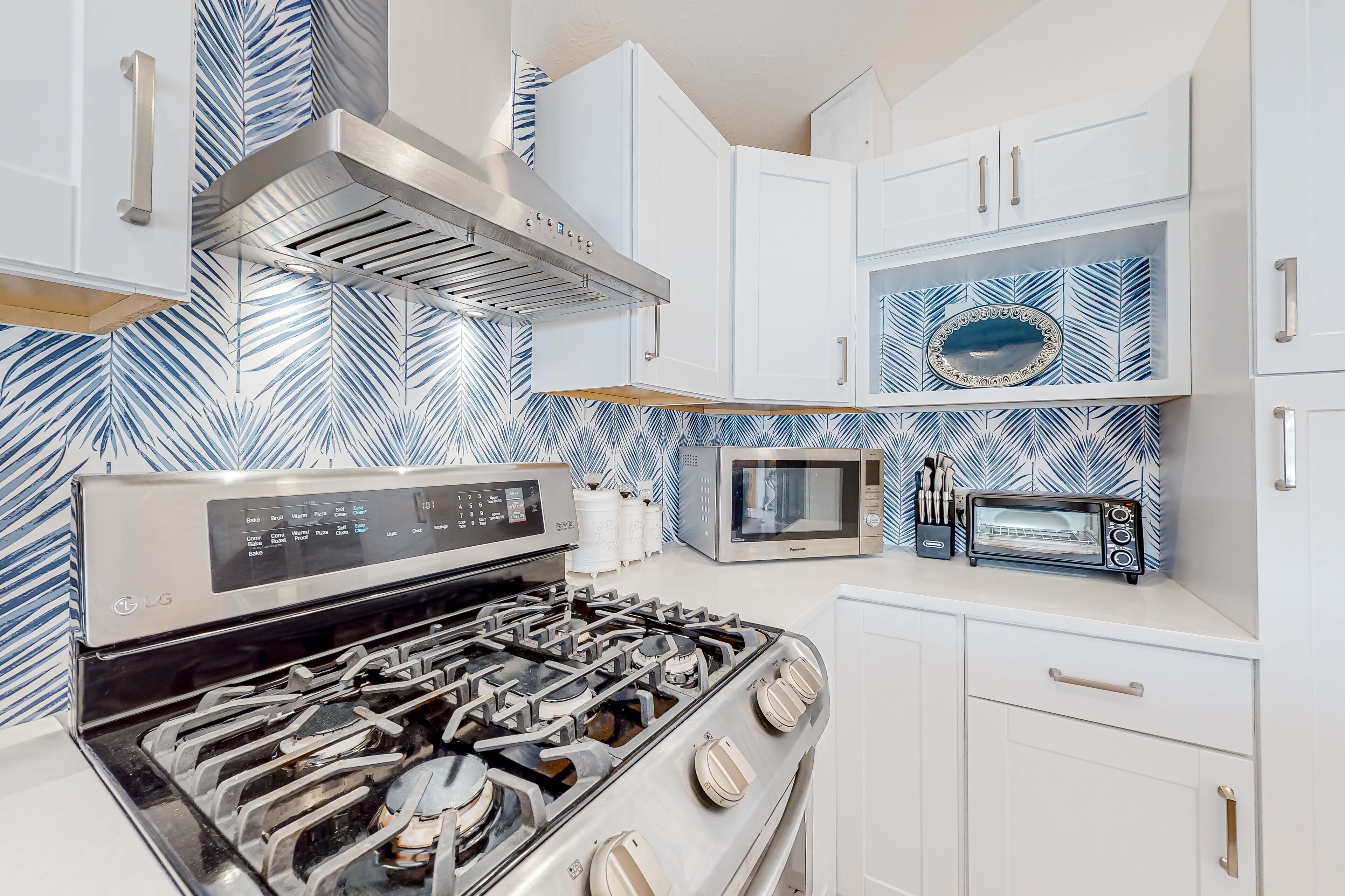 Single-level riverfront retreat with a dock, electric fireplace, & washer/dryer