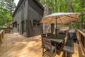 Outdoor dining - Stylish Cabin w/ Hot Tub, Fire Pit & Forest Views (Swanton)