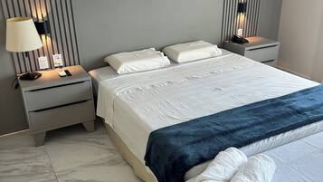 Basic Quadruple Room, 1 Bedroom | Free WiFi, bed sheets