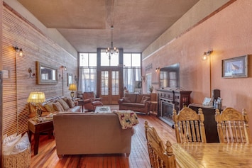 Imagine 14' ceilings in a massive open living room and kitchen