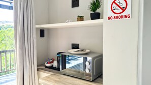 Family Room | Private kitchenette | Mini-fridge, microwave, freezer, dining tables