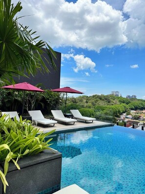 Outdoor pool, open 7:00 AM to 8:00 PM, free pool cabanas, pool umbrellas