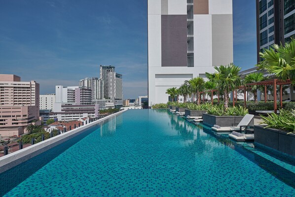 Outdoor pool, open 7:00 AM to 8:00 PM, free pool cabanas, pool umbrellas