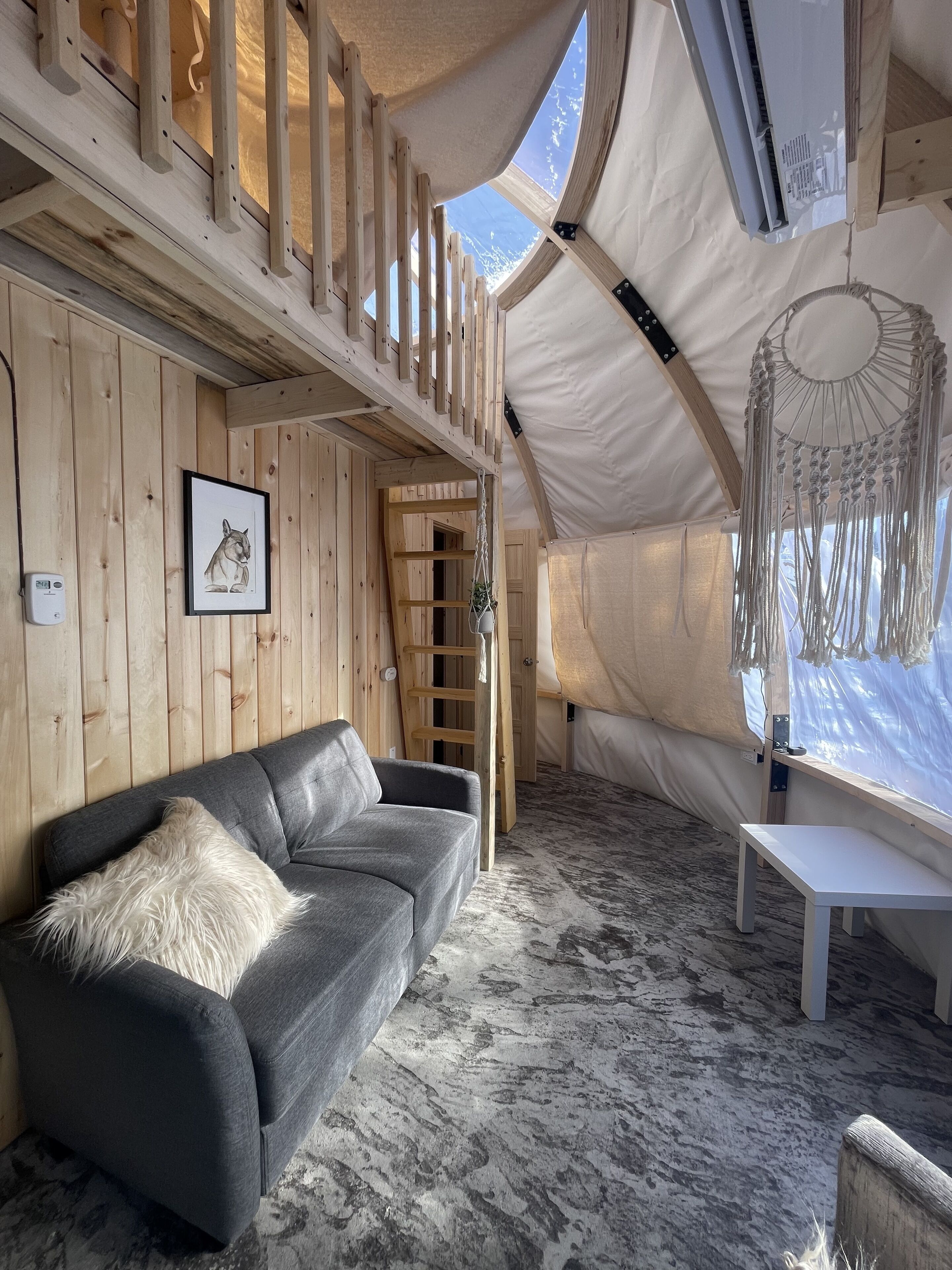 Deluxe Tent | Living area | Fireplace