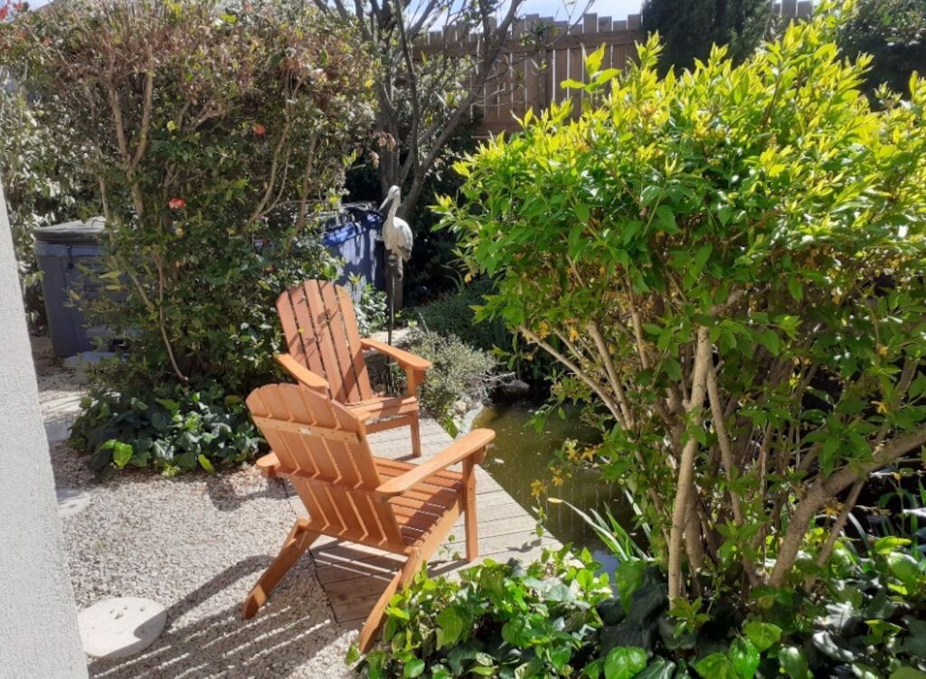 the casita, place of relaxation with jacuzzi, pool, green exterior and swimming pool